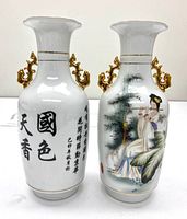 Front and back views of two hand painted Chinese porcelain vases showing a girl playing flute next to trees, gold ornamental handles, and Chinese calligraphy with reign marks.