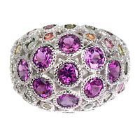 Front view of the dome ring showing multiple round faceted rhodolite garnet stones in purple with scattered tourmaline stones in various colors, set in silver-tone metal with detailed beaded rims.