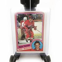 Front view of vintage 1984 Topps Steve Yzerman rookie card #49 in protective display holder