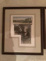 Photo of antique framed lithograph with two vertically stacked train scene prints.