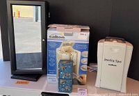 Salton Jewelry Spa unit alongside box and two jewelry boxes