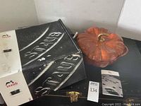 Box, cocotte, lid and manual displayed