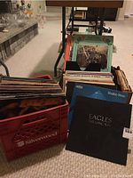 Milk crate filled with vinyl LP records, crateside marked Silverwood