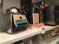 Osterizer Classic 11-speed blender, Proctor-Silex Popcorn Pumper in box, part of the lot of small kitchen appliances