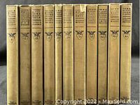 Photo of 11 hardcover yellowish-spined vintage books from The Chronicles of America series by Yale University Press, showing titles and volume numbers on spines.