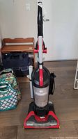 Full view of Dirt Devil Spin Pro CleanPath Vacuum model UD70180 upright vacuum cleaner showing body, handle, and power cord wound on side.