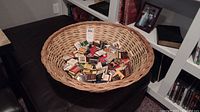 Woven basket filled with more than 50 matchbooks from various places