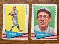 Front view of two 1961 Fleer Baseball Greats cards featuring Max Carey in batting stance and Miller Huggins portrait.