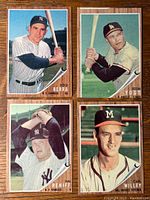 Four 1967 Topps baseball cards featuring Yogi Berra, Eddie Yost, Hal Reniff, and Carl Willey in a 2x2 layout.