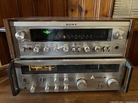 Two stacked receivers viewed front-on showing overall appearance