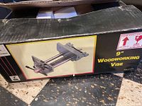 Box of the 9-inch woodworking vise showing picture and product label.