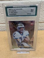 Front view of the graded Dan Marino football card in protective case showing the card face and grading label.