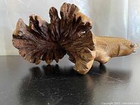 Photo showing natural burl pattern on underside fin and detailed koi head with eye detail