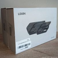 Box showing two LEXIN dual pack Bluetooth motorcycle helmet intercom units, front and side view with product and brand markings.