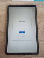 Front of Samsung Galaxy Tab S6 Lite showing welcome screen