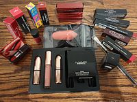 Overview of all MAC makeup items from above showing various products in packaging