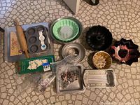 Overview of baking items including wooden rolling pin, muffin tins, Bundt pans, cookie sheets, and cookie cutters.