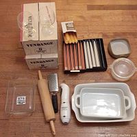 Full lot including goblets, candles, Pyrex dishes, blender, grater, rolling pin.
