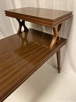 Close-up showing the detailed double-tier design and wood grain finish of the Mid Century Modern table.