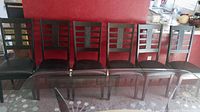 Full set of six Ashley dining chairs arranged side-by-side.