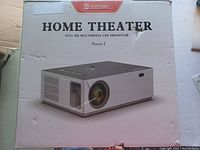 Front view of the original box for bomaker Home Theater LED projector model Parrot I showing product image and name.