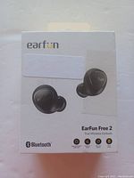 Front of the retail box showing EarFun Free 2 true wireless earbuds, brand, model, and Bluetooth logo.