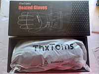 Box with ThxToms Heated Gloves branding and glove image on top.