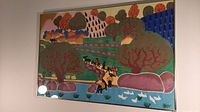 Framed acrylic on paper artwork showing a colorful landscape with trees, river, figures, and ducks. Framed with visible reflections.