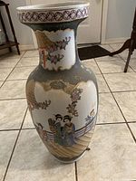 Photo shows full view of 24-inch Royal Satsuma Oriental vase with hand-painted Japanese scenes and detailed gold embellishments.