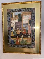 Full view of framed silk embroidery hanging showing the detailed embroidered scene and frame style