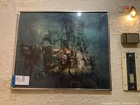 Front view of framed abstract floral lithograph in silver-tone frame
