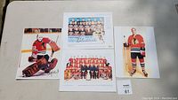 Eight 8x10 color photos showing Tony Esposito in goalie gear, Bobby Hull in uniform, two team photos from 1961 and 1957-58, plus additional Black Hawks images.