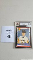 Front of 1990/91 Score #428 Jaromir Jagr rookie card graded KSA 9 mint in protective plastic case with label