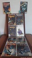Flatlay of all ten Batman comic books in the lot, showing the cover art and arrangement.