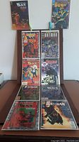 Overview of 9 of the Batman comics laid out showing cover illustrations.
