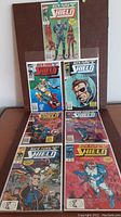 Seven Nick Fury, Agent of S.H.I.E.L.D. comic books arranged in two rows, showing covers clearly to identify issues in very good condition.