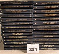 Stack of 28 hardcover novels by Agatha Christie showing titles and author on the spines.