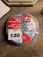 Photo of 200' roll of Strata Super Heavy Duty clothesline in original packaging showing product label and features.