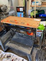 Workmate 400 portable workbench showing front view and surface wear