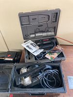 Sears Craftsman planer and Roto-Zip saw with cases and instruction manuals