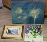 Three paintings together: abstract acrylic on panel (top right), abstract oil on canvas (top), and small framed landscape oil painting signed A. Merakirn (bottom left).