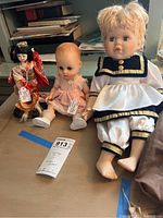 Image showing all three vintage dolls side by side including the Geisha doll, Ginny baby doll, and Porcelain Rose doll.
