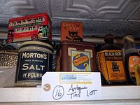 Overview of first group of vintage advertising tins on top shelf, showing Afternoon Tea, Cat’s Paw, Morton’s, Caldoron and Black-Iron tins