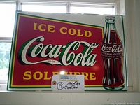Front full view of vintage Coca Cola tin metal sign showing logo and bottle graphic