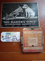 Overview of both items on tabletop with auction tag visible