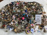 Image showing a large pile of assorted jewelry bits and pieces with varied colors and styles.