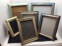 Group photo of six retro picture frames showing their size and style.