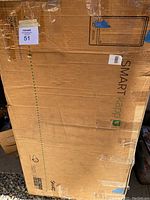 Cardboard box labeled SMART kapp 42 capture board with MaxSold auction tag, showing the packaging condition and branding.