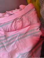 Close-up of pink and white striped soft cotton J.Crew Vintage Cotton top.