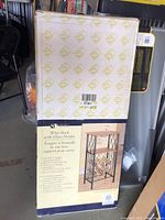 Photo of unopened wine rack box showing product image and key details.